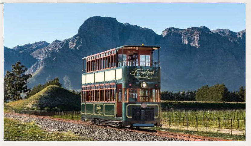 The Franschhoek Wine Tram among the vineyards of the Franschhoek valley